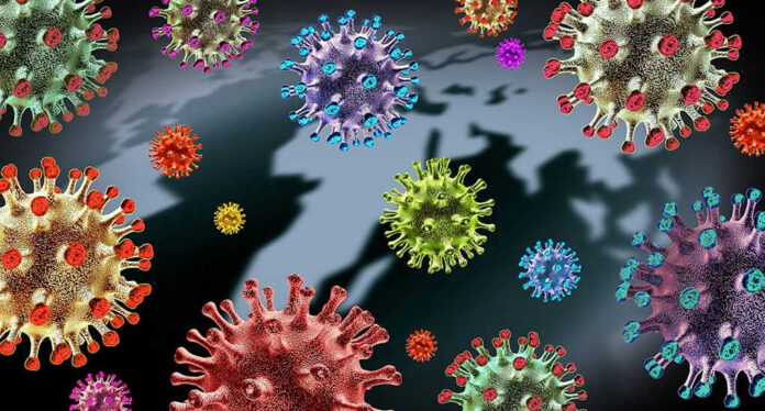 Colorful virus illustrations over a world map