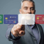 Metal Coins to Digital Wallets: Credit’s Evolution Man interacting with virtual credit card interface