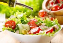 Shocking Diet Discovery: Reverse Brain Aging! Fresh salad being drizzled with olive oil