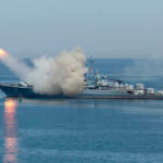Warship firing missile in the sea