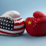 China SUE Missouri: $50 Billion USA and China boxing gloves facing each other.