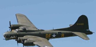 Boeing B-17 flying against a clear blue sky