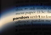 Trump Wipes Records For Five NFL Names The word pardon highlighted in a dictionary.