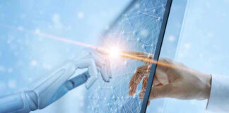 Robotic and human hands touching through a screen.