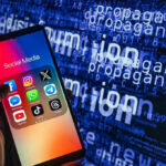 WhatsApp and YouTube Vanished in Russia Smartphone showing social media apps with text background.