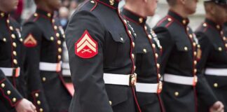 Marines in formal uniforms marching during a parade