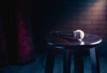 Vince Vaughn’s Scathing Late-Night Takedown Microphone resting on a stool on stage.