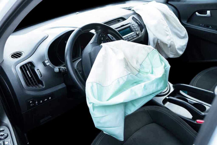 Deployed airbags in cars interior.