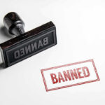 Banned stamp and rubber stamp on white background.