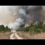 LIVE: New update as raging wildfires destroy homes, force