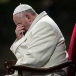 Trump UNLEASHES on Pope — Unprecedented Attack Stuns Vatican Pope sitting with his head bowed and hand covering his face