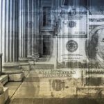 Architectural columns with a background of U.S. currency