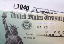 Close-up of a U.S. Treasury check and tax form 1040