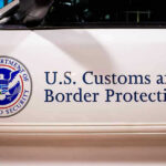 Scandal Hits Border Chief—Shocking Resignation! U.S. Customs and Border Protection vehicle logo and text.