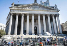Newsom Insider’s Shocking Fraud in Court Courthouse facade with media crews setting up outside.
