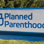 Undercover Audio Sparks Planned Parenthood Showdown Planned Parenthood sign on a grassy lawn.
