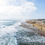 Serial Killer in Paradise? Puerto Vallarta Horror Crowded beach with waves and people enjoying sun.