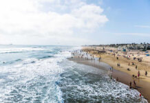 Serial Killer in Paradise? Puerto Vallarta Horror Crowded beach with waves and people enjoying sun.