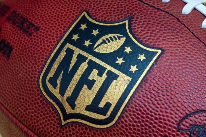 shutterstock_212182807 Close-up of an NFL football with the logo prominently displayed