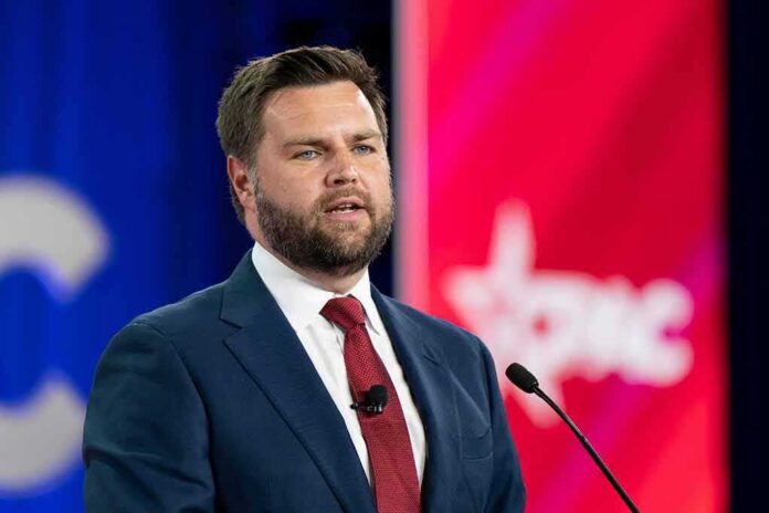 shutterstock_2186937099-6- A man in a suit speaking at a podium during a conference