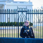 Drone Fears Shadowed Trump’s Ringside Night Secret Service agent stands guard outside the White House.