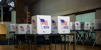 Voting booths set up in a room.
