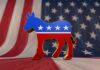 Texas Flip-Flop? Democrat’s Sudden Surgery Stand A donkey symbol representing the Democratic Party in front of an American flag background