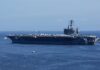 Missed Red Flags—Now a Sailor Dead A large aircraft carrier sailing in the ocean