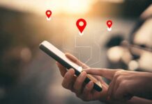 Supreme Court Smacks Geofence Dragnets Person using a smartphone with location markers displayed on the screen