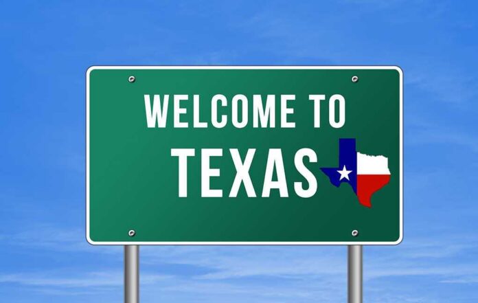 Welcome to Texas road sign with a Texas map