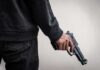 Cartel-Style Hit Stuns Mayor’s Office person holding a handgun at their side