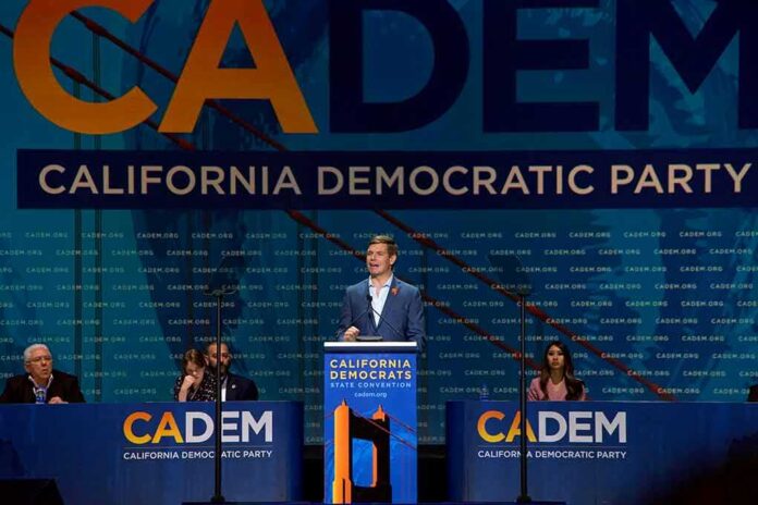 Speaker at podium during California Democratic Party event