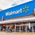 Exterior view of a Walmart store with customers entering
