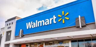 Exterior view of a Walmart store with customers entering
