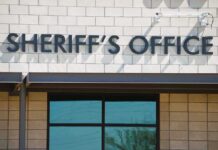 Veteran Couple Slain — Timeline Doesn’t Add Up sheriff's office building exterior sign