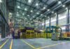$500M Ammo Plant Delivers… Nothing Interior view of a modern industrial facility with manufacturing equipment