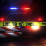 Car Bomb Near Ireland—Chilling Twist Missing Police car behind crime scene tape at night