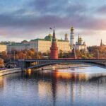 Spy Chiefs Huddle, Agenda Unknown Kremlin complex by a river at sunset