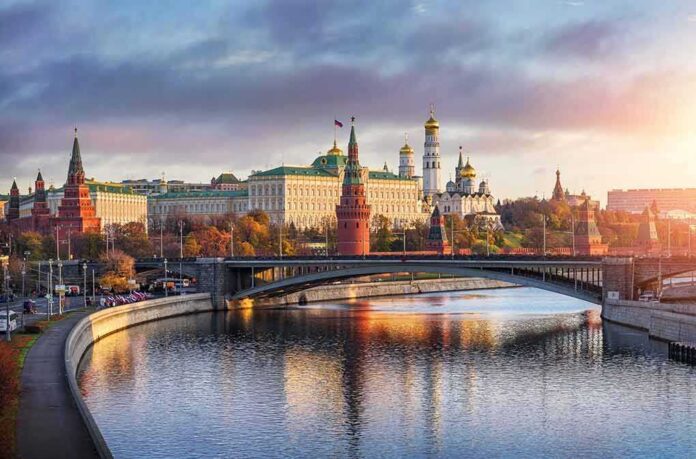 shutterstock_1709913229 Kremlin complex by a river at sunset