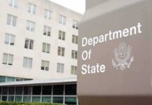 Treasury Hammer Puts Banks On Notice Department of State sign outside office building