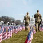 Nationwide Carry Twist Targets SEALs, Rangers Two soldiers walk among American flags toward the U.S. Capitol