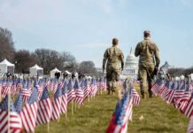 Nationwide Carry Twist Targets SEALs, Rangers Two soldiers walk among American flags toward the U.S. Capitol