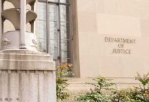Inside Job? Prosecutors Zero In On Comey Department of Justice building facade with stone sign and window