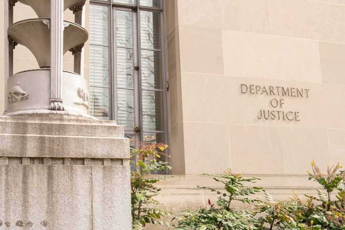 Department of Justice building facade with stone sign and window