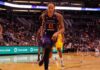 basketball player dribbling on a court during a game
