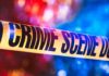 Police Uncover Planned Child Killings Crime scene tape with blurred emergency lights in background