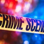 Police Uncover Planned Child Killings Crime scene tape with blurred emergency lights in background