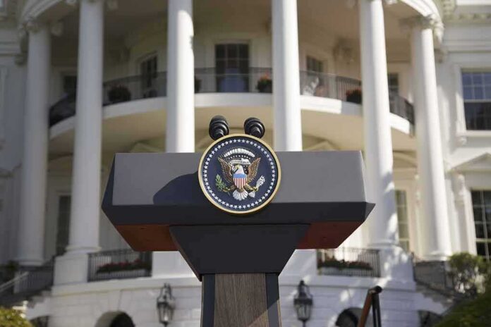 shutterstock_106049342 Presidential podium with seal in front of white-columned building
