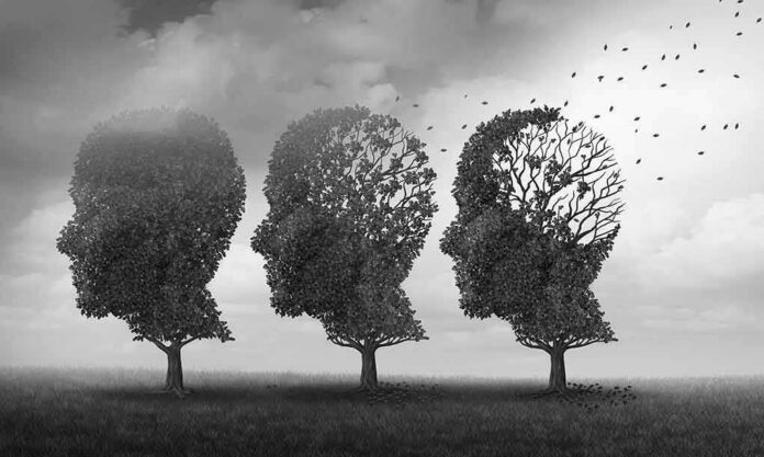 shutterstock_1085332631 Three trees shaped like human heads losing leaves