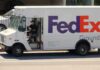 FedEx Ground delivery truck parked on a street